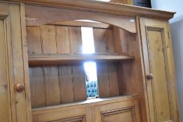 A rustic pine dresser back, width approx. 190cm