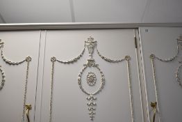 A white finished Olympus continental style triple wardrobe