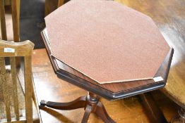 A modern mahogany octagonal occasional table in the Regency style