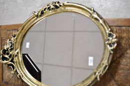 A modern gilt frame wall mirror, height approx. 65cm