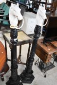 A pair of traditional cast iron horse tethering posts, height approx. 130cm