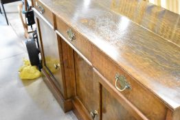 A traditional oak sideboard in the period style, width approx. 153cm