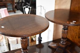 A pair of Titchmarsh and Goodwin oak circular occasional coffee tables ,diameter approx. 60cm