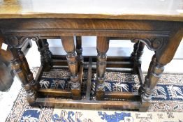 A Titchmarsh and Goodwin oak nest of one over two tables, approx. 61 x 38cm