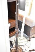 Three assorted standard lamps and shades