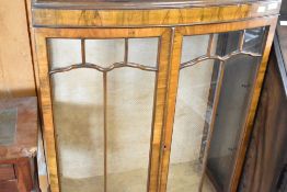 An early 20th Century walnut china cabinet, width approx. 74cm