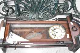A traditional Vienna style wall clock of small proportions, height approx. 83cm