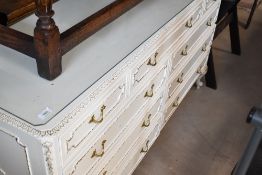 A vintage white continental style multi drawer bedroom chest, width approx. 142cm