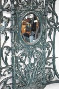 A cast iron verdi gris green cast iron hall stand having marble top, in the 19th Century