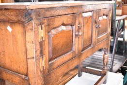 A Titchmarsh and Goodwin or similar oak side cabinet, width approx. 107cm