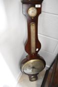 A 19th Century mahogany cased barometer having silvered dials