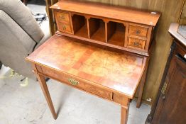 A reproduction yew wood ladies writing desk (bonheur du jour)