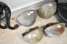 Four vintage tanalised water bowls
