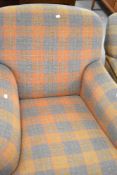 A Tetrad armchair , in tartan upholstery