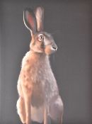 An eye catching polychrome canvas print, depicting an alert hare against a black background,