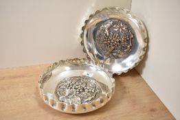 A pair of Walker & Hall silver plated dishes, embossed with grapes and foliage decoration, impressed