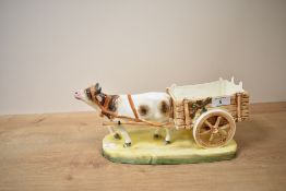 A Czechoslovakian Pottery cow and trap centrepiece, impressed mark to base 32.5cm wide