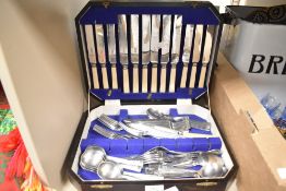 A vintage oak canteen containing Pedigree stainless steel cutlery, A/F
