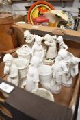A selection of German white porcelain figures/figurines in the style of Kaiser, comprising boys