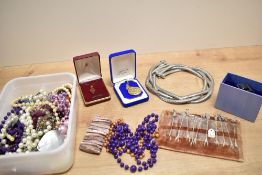An assortment of costume jewellery, including beaded necklaces, statement pieces and a gold plated