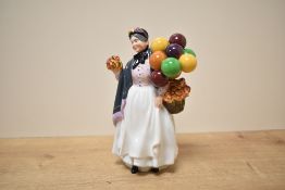 A Royal Doulton 'Biddy Penny Farthing' HN1843 figurine in original box