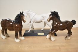 Three Royal Doulton bone china horse studies comprising 'Spirit of Freedom', and two Shires in brown