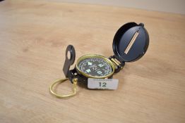 A Japanese YCM military style lensatic compass