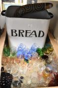 A vintage enamel bread bin sadly missing the lid sold along with a large collection of shot/spirit