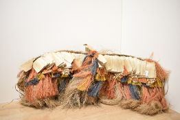 A Pulpul grass skirt with multi-coloured fibre band, L72cm