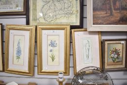 A pair of floral prints nicely mounted within gold frames 42cm x 26cm sold with a similar print