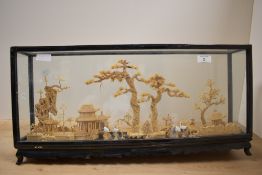 A vintage Chinese three dimentional cork art diorama under a glass and black lacqured case,