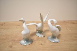 A group of three Lladro porcelain geese studies, all complete with boxes.
