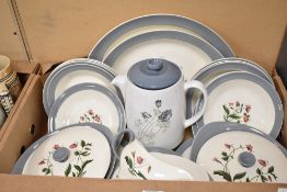 A Wedgwood Mayfield pattern part dinner service, decorated with foliage on a white ground with