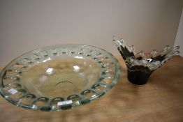 A large contemporary open work thick glass bowl, w41cm, sold together with a splash glass vase,