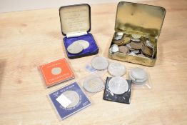 An Isle of Man One Pound Piece, sold together with a Isle of man silver jubilee coin, a Gold