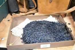 A box of vintage ladies accessories, containing: A piece of cream pineapple lace, layered with