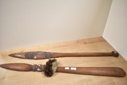 A tribal hand club style Taiaha, carved with inlaid mother of pearl paua eyes, L91cm