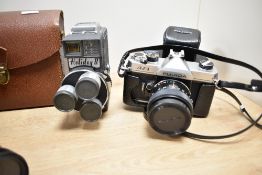 A vintage Holiday II camera with 8mm flash, sold together with a pair of binoculars and a Fujica