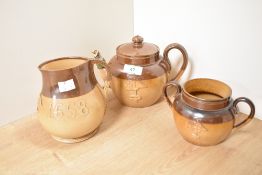 A Royal Doulton stoneware Whisky jug, decorated dated 1658 and RSM, pattern No. 3310, marked The