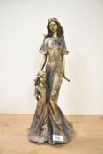 A resin study depicting mother and daughter, chips to both heads and chip to the mother's hair,