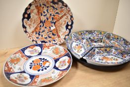 A Japanese style lazy Susan Hors d'oeuvres dish, decorated with floral patterns, blue border on a