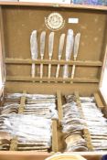 A oak canteen of Thia bronze bamboo pattern cutlery, to include forks, knives and spoons,