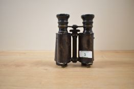 A Pair of Huet Paris extra lumineuse 8x binoculars