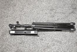 A black metal adjustable music stand, closed h59cm x open h118cm