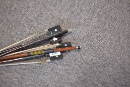 Four assorted cello bows including Knoll