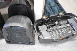 A Carlsbro T150 traveller PA (armadillo style), includes one microphone and XLR cable