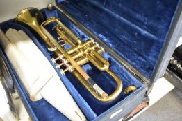 A B & M Champion brass trumpet, with fitted case etc