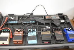 A Boss BCB-60 pedal board, housing the following Boss pedals ; Tuner TU-12, Digital Delay DD-3,