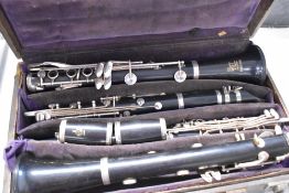 A cased 'pair' of Boosey and Hawkes Emperor clarinets , serial numbers 281490A and 293012