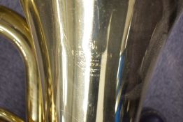 A brass Besson Sovereign tuba by Boosey & Hawkes, in fitted Besson case , height approx. 102cm, with